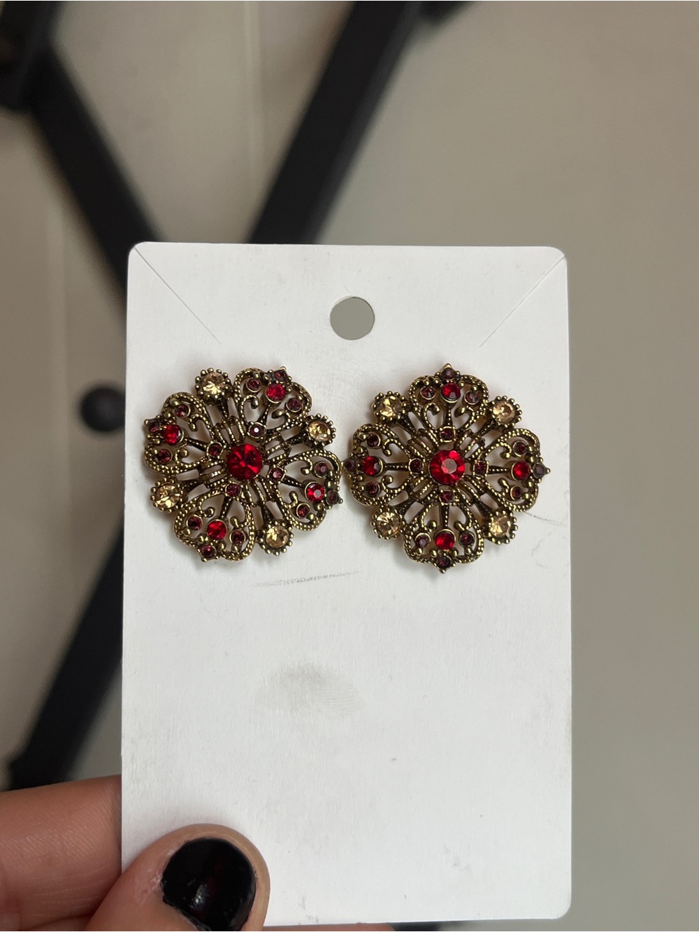 Gold-Tone Floral Filigree Stud Earrings with Red Stones